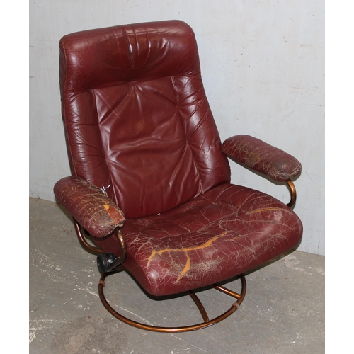 4 - A retro Scandinavian style red leather easy chair with copper finished metal base, no makers marks