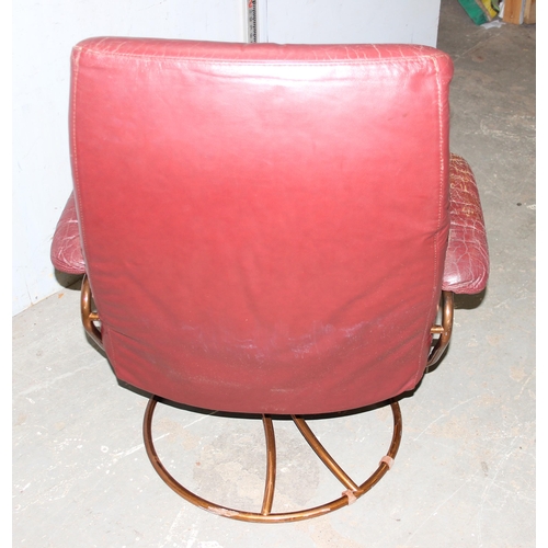 4 - A retro Scandinavian style red leather easy chair with copper finished metal base, no makers marks