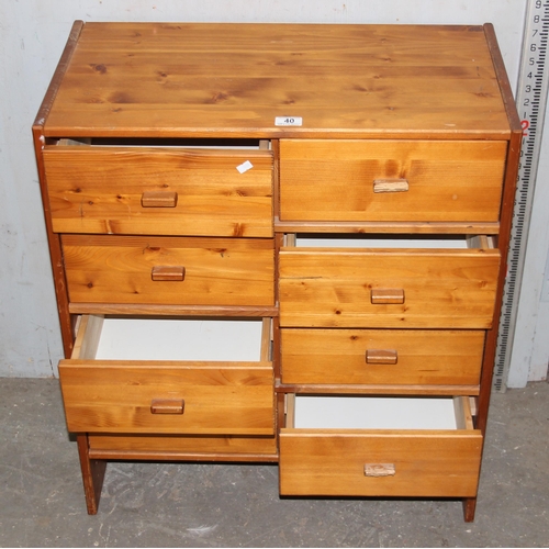 40 - A small modern 8 drawer wooden chest of drawers