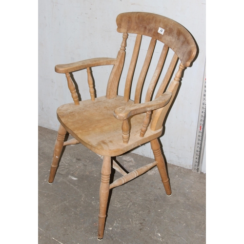 44 - A vintage beech country farmhouse kitchen armchair