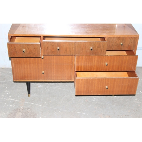 47 - Retro multidrawer dressing table with mirror, seemingly unmarked, approx 115cm wide