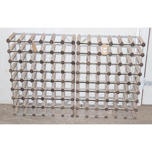 52 - A pair of wooden and metal wine racks, both 6 x 8, 48 bottles in each, 96 bottles total