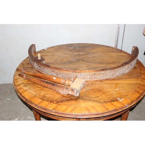 58 - An antique round dining table, likely Continental with impressive carved base and Greek Key carved f... 