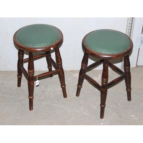 6 - A pair of vintage style green and studded topped stools by Warings Furniture of Norfolk