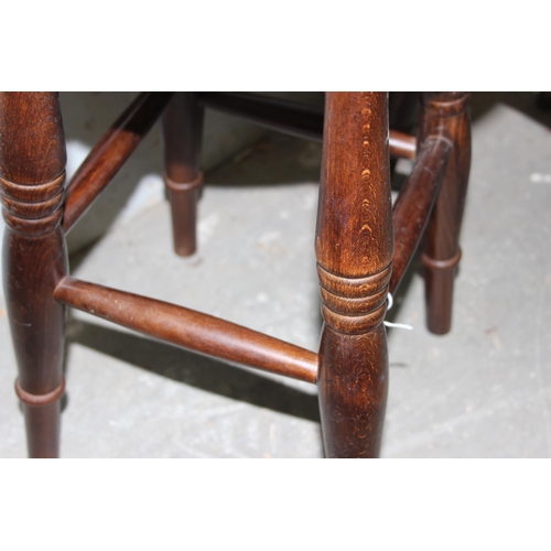 6 - A pair of vintage style green and studded topped stools by Warings Furniture of Norfolk