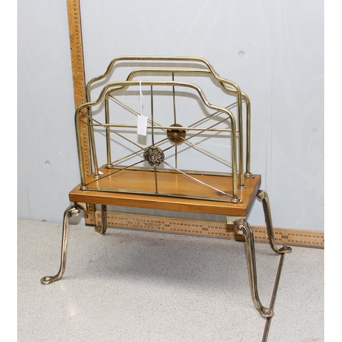 70 - An antique style brass and wooden magazine rack