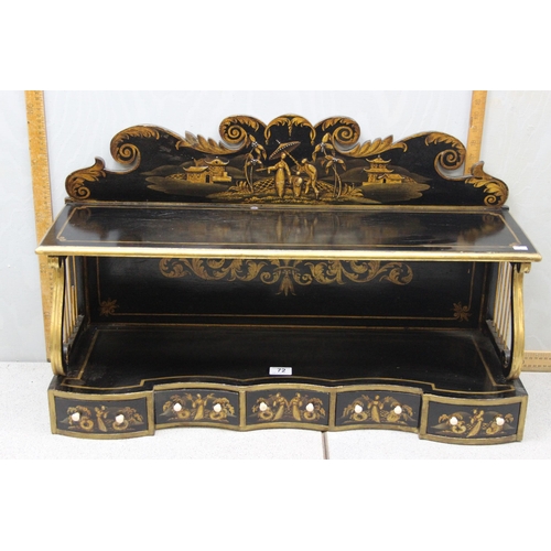 72 - A Regency period black japanned shelf with 5 small drawers and musical themed fretwork ends, approx ... 