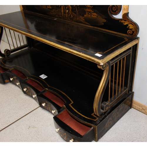 72 - A Regency period black japanned shelf with 5 small drawers and musical themed fretwork ends, approx ... 