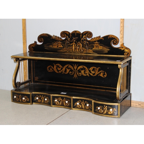 72 - A Regency period black japanned shelf with 5 small drawers and musical themed fretwork ends, approx ... 