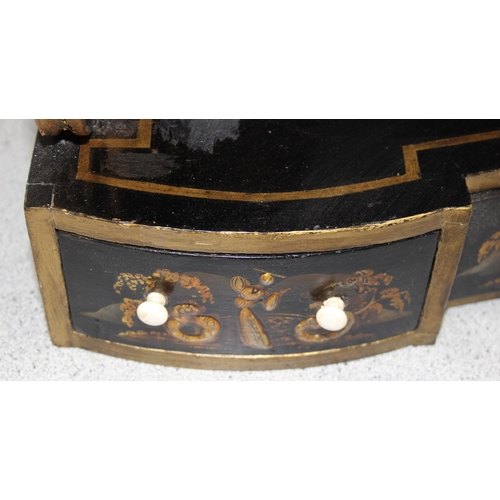 72 - A Regency period black japanned shelf with 5 small drawers and musical themed fretwork ends, approx ... 