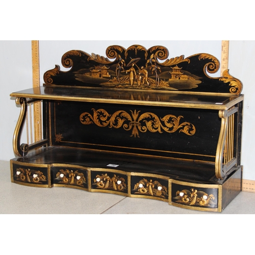 72 - A Regency period black japanned shelf with 5 small drawers and musical themed fretwork ends, approx ... 