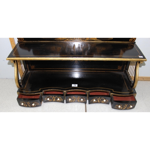 72 - A Regency period black japanned shelf with 5 small drawers and musical themed fretwork ends, approx ... 