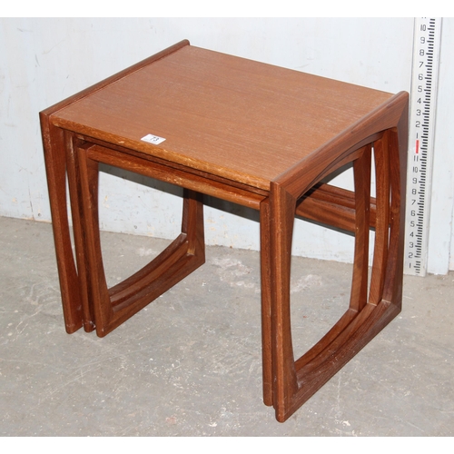 73 - A retro G-Plan style nest of 3 teak tables