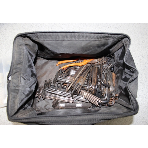 851 - A large bag of allen keys, site light etc