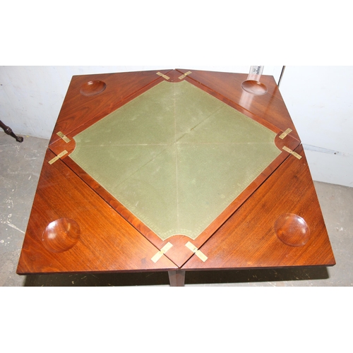 101 - An early 20th century Edwardian mahogany envelope card table