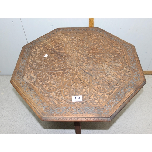 104 - An Indian carved hardwood octagonal table, approx 60cm wide