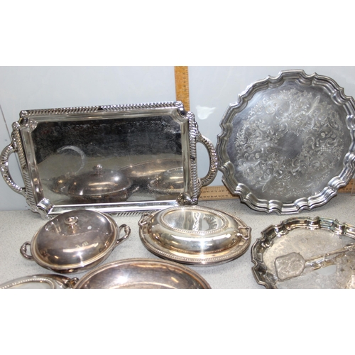 1050 - A large qty of antique and later silver plated to inc Elkington & Co serving dishes, Walker & Hall e... 