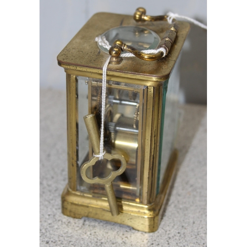 1339 - Vintage brass cased carriage clock with key