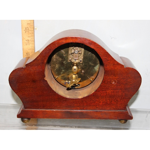 1349 - An Edwardian mantel clock in Sheraton style inlaid case