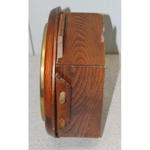 1350 - A small vintage Smiths electric lantern style clock and a wooden cased wall clock (2)