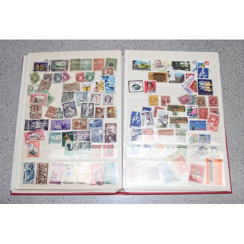 570 - 2 stamp albums with GB & foreign content and a folder of GB FDC's