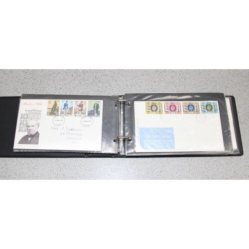 570 - 2 stamp albums with GB & foreign content and a folder of GB FDC's