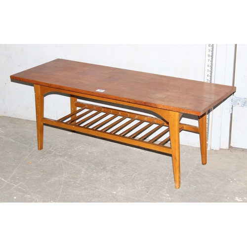 92 - Mid century teak coffee table with magazine rack