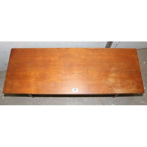 92 - Mid century teak coffee table with magazine rack