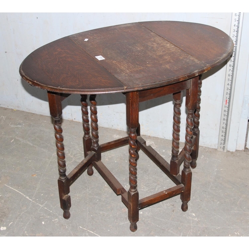 111 - Antique oak drop leaf table with barleytwist legs