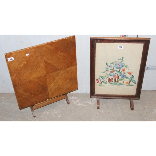 112 - A small folding table and a vintage embroidered fire screen