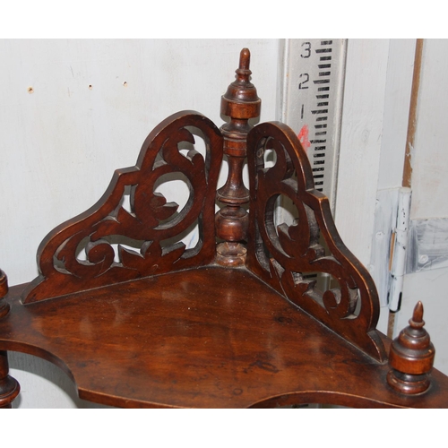 116 - An antique mahogany whatnot with fretwork details, approx 130cm tall