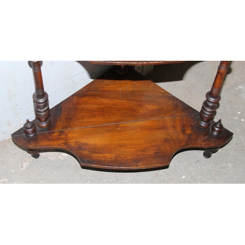 116 - An antique mahogany whatnot with fretwork details, approx 130cm tall