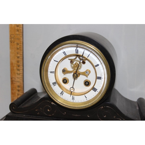 1352 - A 19th century slate cased mantel clock with visible escapement, French movement with pendulum, gilt... 