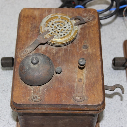 712 - 2 early 20th century wooden cased wall telephones, no makers marks