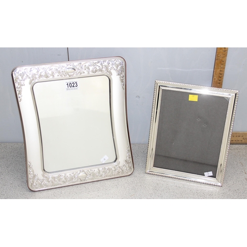 1023 - A large Italian silver plated table mirror and a silver plated photograph frame