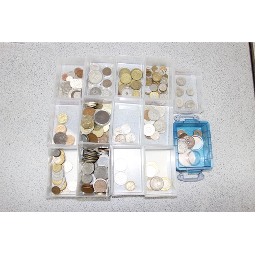 1272 - A huge qty of assorted world coins to inc many silver examples, purely sorted into countries by the ... 