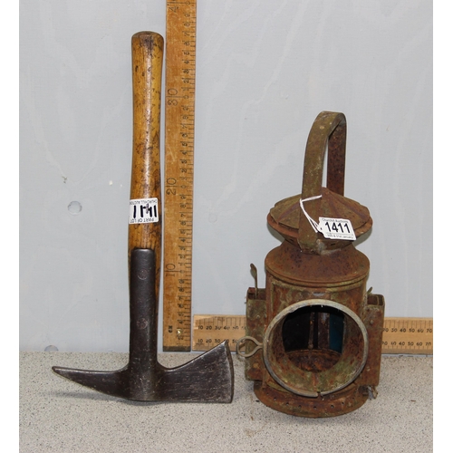 1411 - Early 20th century wooden handled fireman's axe and a 1945 dated Harry Pratt military lamp (2)