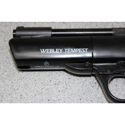 1414 - Webley Tempest .22 air pistol in leather holster, with a tin of pellets