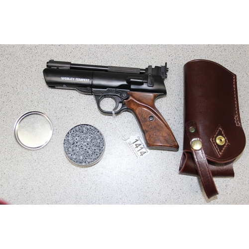 1414 - Webley Tempest .22 air pistol in leather holster, with a tin of pellets