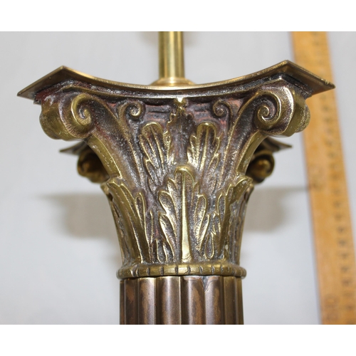 241 - An impressive pair of brass table lamps formed as Corinthian columns, each approx 95cm tall