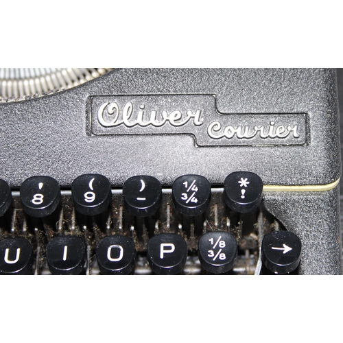 706 - A vintage Oliver Courier typewriter in case