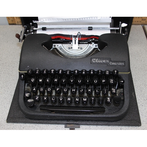 706 - A vintage Oliver Courier typewriter in case