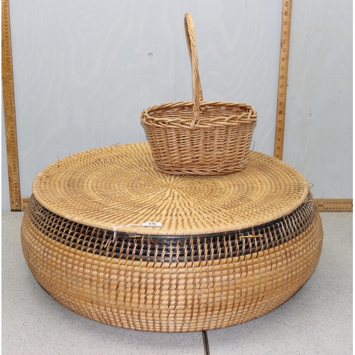 75 - A large low wicker basket with lid, approx 65cm in diameter & a small wicker basket (2)