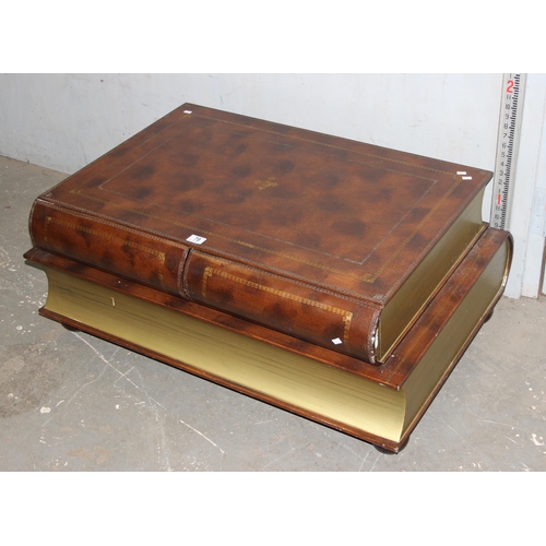 79 - A 20th century coffee table formed as 2 large books, with 2 drawers, approx 100cm wide