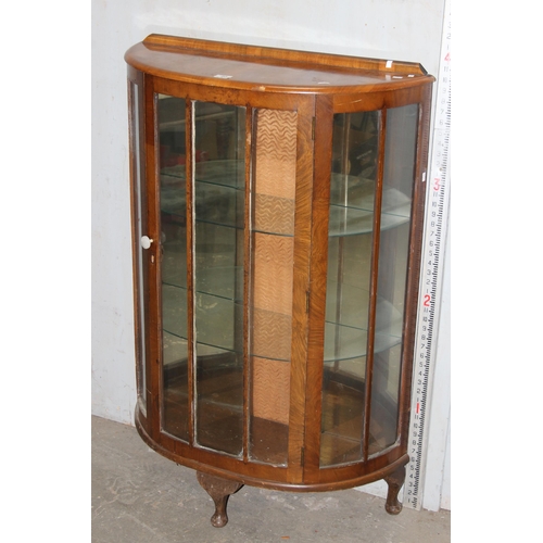 80 - An Art Deco period demi-lune display cabinet