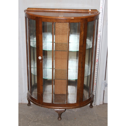 80 - An Art Deco period demi-lune display cabinet