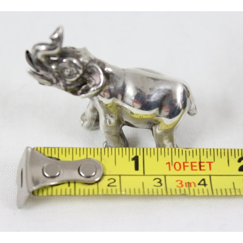 1036 - Cast sterling silver model of an elephant, approx 40cm long, London 2008, approx 22.41g gross