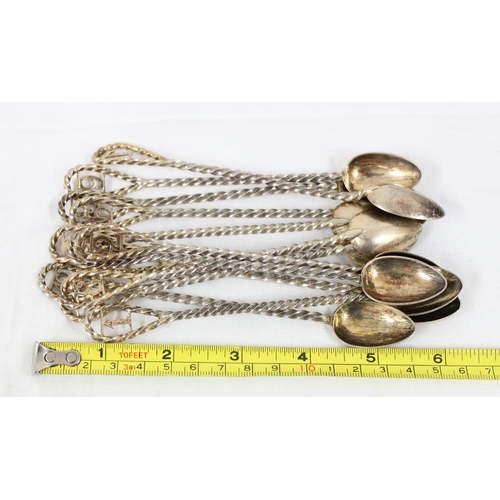 1041 - An unusual set of 12 numbered silver plated spoons with twisted stems, each marked JH patent