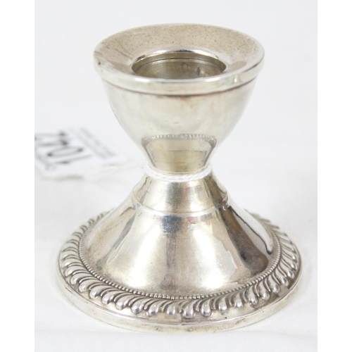 1042 - A pair of sterling silver dwarf candlesticks, weighted, likely American, approx 6cm tall