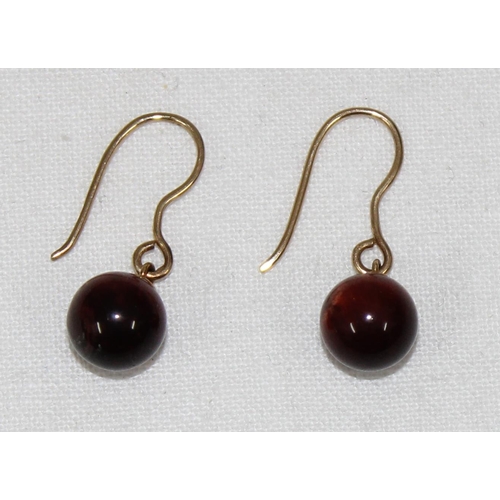 1102 - A pair of 9ct gold and Tiger's Eye drop earrings, marked 9k but XRF confirmed